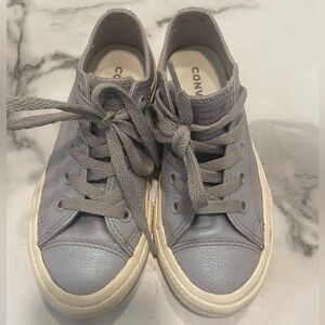 Powder blue/slate gray iridescent Converse.